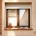 Ventanas expuestas al sol de verano en una vivienda de Getafe